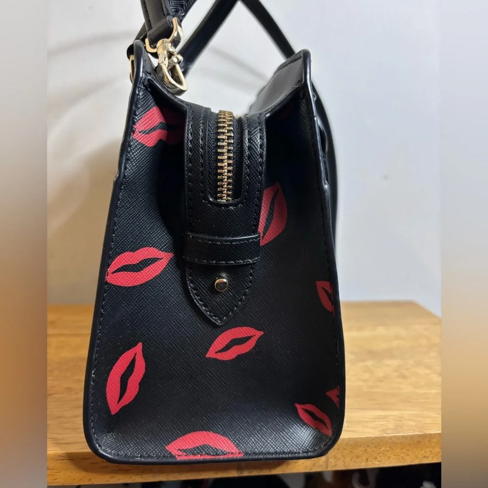 Kate Spade New York Madison Lip Toss small satchel in black saffiano leather